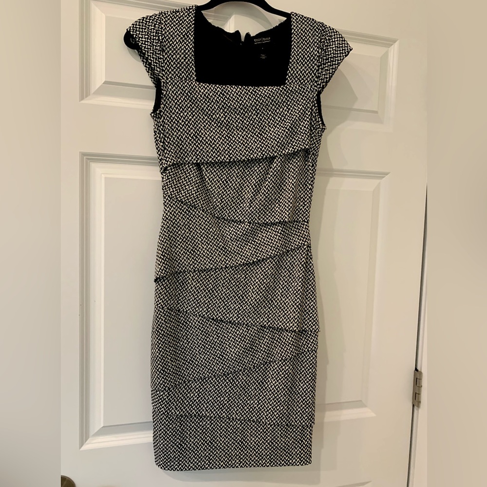 Women’s black and white dress with instant slimming support